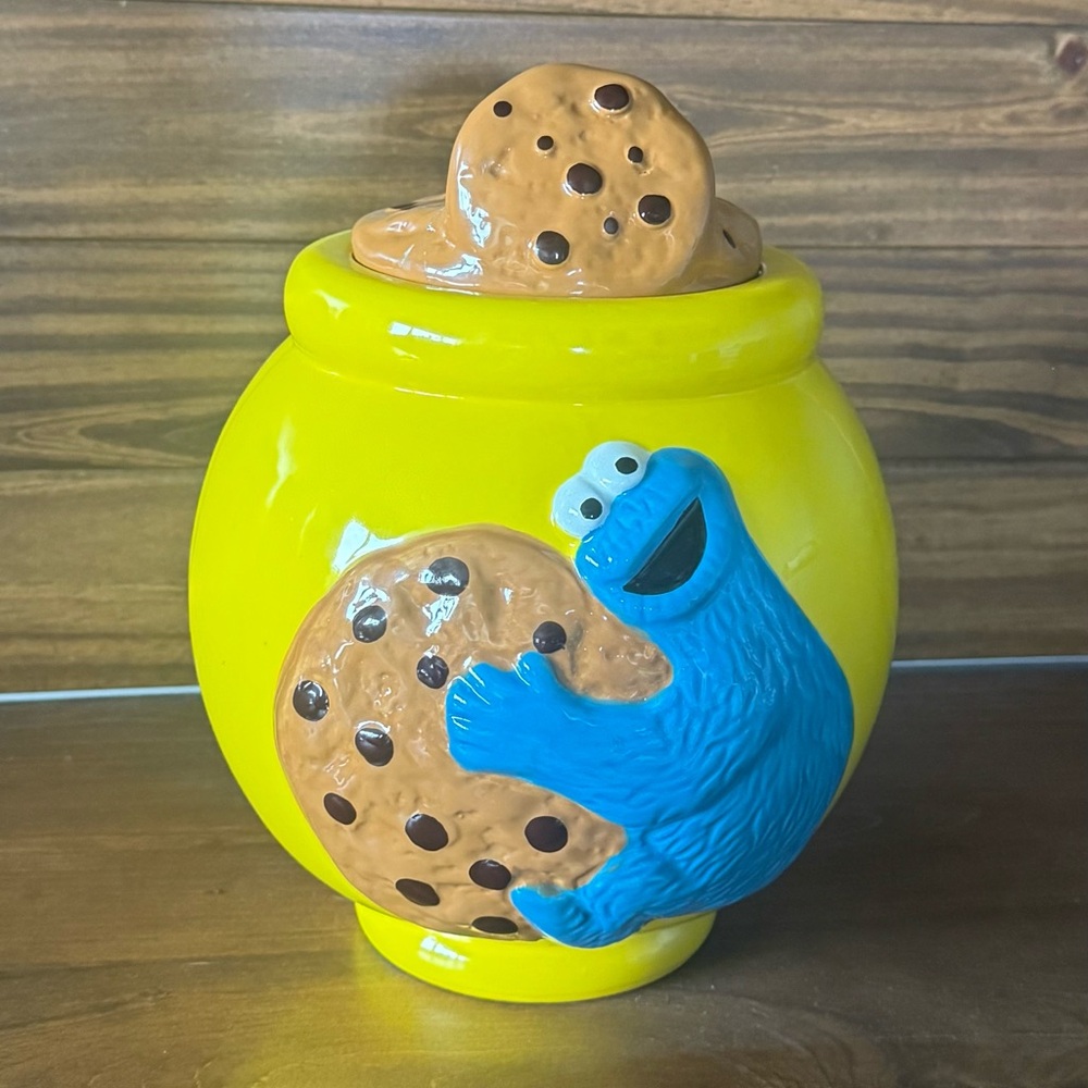 Yellow Cookie Jar with Blue Character Design